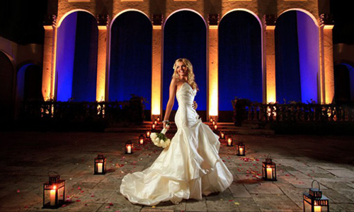 Bride in the Illuminated Arched Courtyard at The Bell Tower on 34th